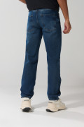 Jean 90´S holgado azul oscuro con bota recta y tiro bajo