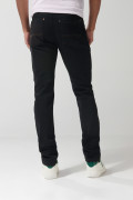 Jean negro tipo skinny ceñido con tiro bajo y cremallera