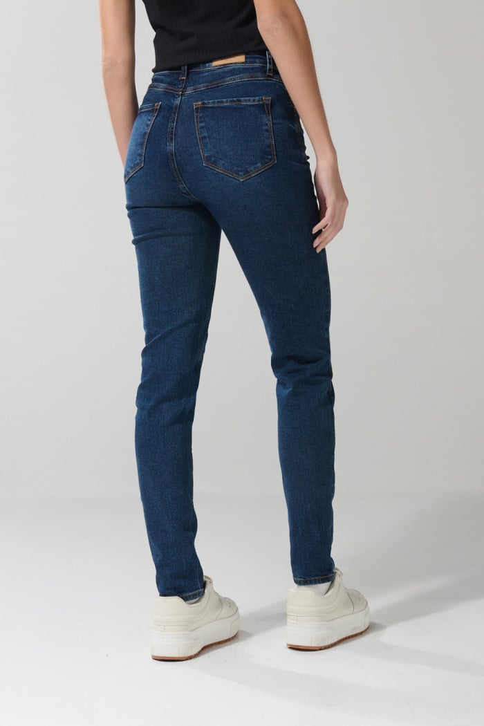 Jean jegging ceñido azul oscuro con tiro súper alto