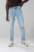 Jean tiro bajo slim azul claro con rotos y bolsillos
