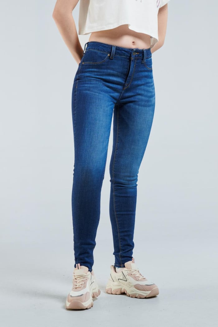 Jean Jegging azul oscuro con tiro alto, bolsillos y ajuste ceñido