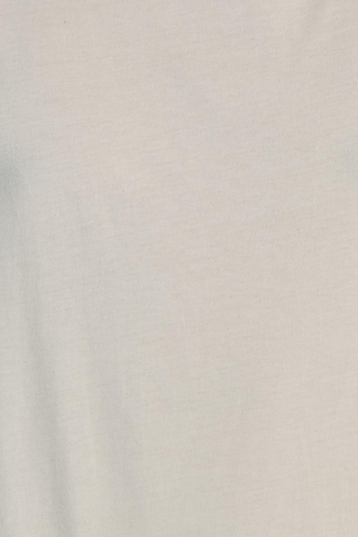Camiseta unicolor con manga ranglan corta en contraste