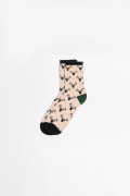Medias largas kakis con contrastes y diseños de animales