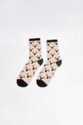Medias largas kakis con contrastes y diseños de animales