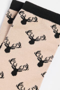 Medias largas kakis con contrastes y diseños de animales