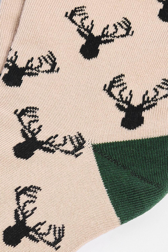 Medias largas kakis con contrastes y diseños de animales