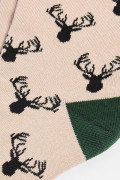 Medias largas kakis con contrastes y diseños de animales