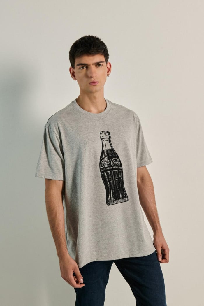 Camiseta oversize de Coca-Cola unicolor manga corta