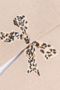 Medias kakis cortas con diseño de moño animal print