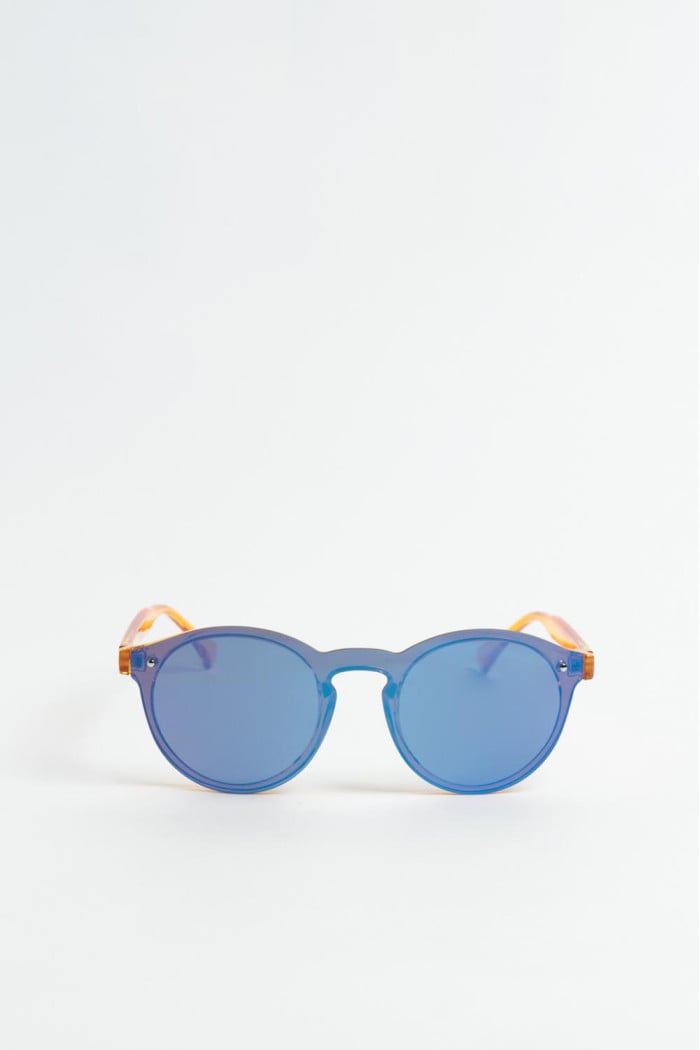 Gafas amarillas de sol con marco redondo y lentes azules