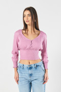 Blusa unicolor con manga larga y cintura encauchada