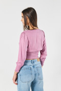 Blusa unicolor con manga larga y cintura encauchada