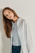 Blusa a rayas unicolor oversize con manga larga
