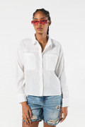 Blusa unicolor con cuello camisero, manga larga y charreteras