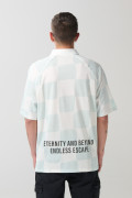 Camiseta crema a cuadros college oversize con cuello polo