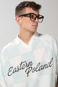 Camiseta crema a cuadros college oversize con cuello polo