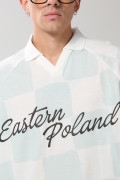 Camiseta crema a cuadros college oversize con cuello polo