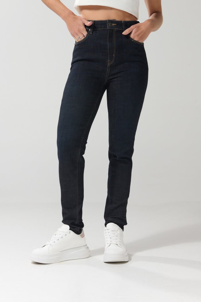 Jean azul intenso jegging ceñido con súper tiro alto