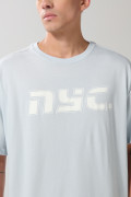 Camiseta oversize azul manga corta con diseños college