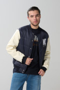 Chaqueta azul bomber college con mangas en contraste