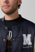 Chaqueta azul bomber college con mangas en contraste