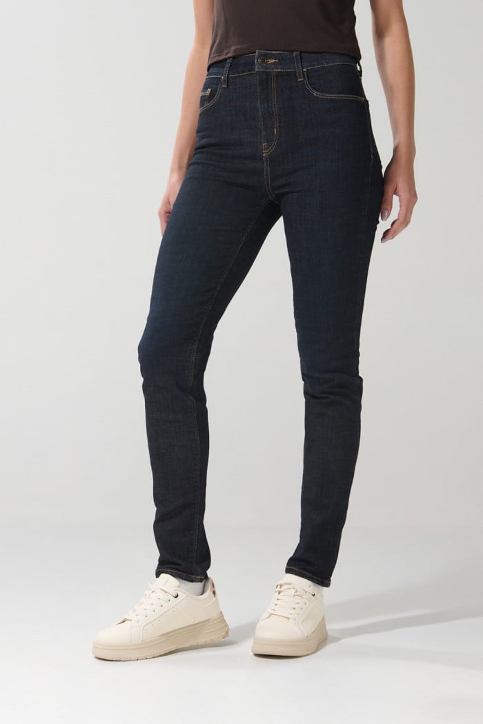 Jean jegging ceñido tiro súper alto azul con bolsillos