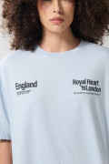 Camiseta oversize azul clara college con cuello redondo