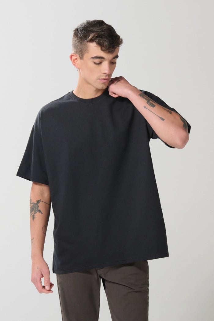 Camiseta en fleece grueso unicolor oversize manga corta