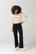 Jean 90´S negro tiro alto con bota recta y cremallera