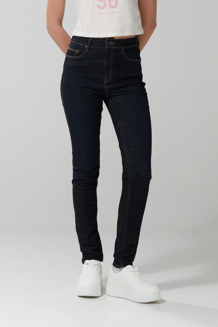 Jean azul intenso jegging ajustado con súper tiro alto