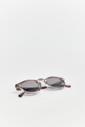 Gafas de sol, marco redondo el gris azulado con lente polarizado.