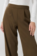 Pantalón verde oscuro palazzo con tiro alto y bota ancha