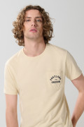 Camiseta unicolor college con bolsillo y cuello redondo