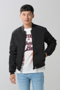 Chaqueta unicolor bomber con bolsillos y acabados en rib