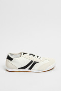 Tenis tipo casuales unicolores con contrastes laterales