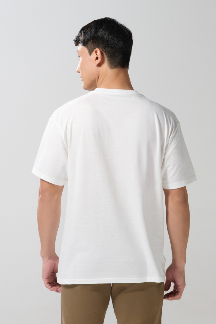 Camiseta manga corta unicolor con diseño de playa