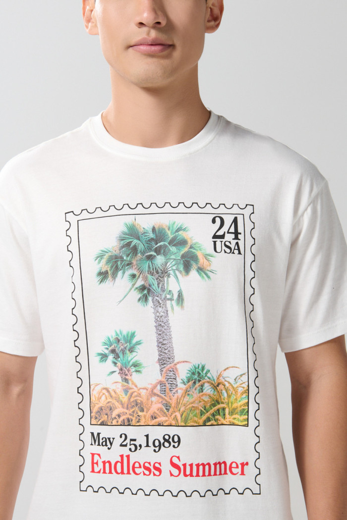 Camiseta manga corta unicolor con diseño de playa
