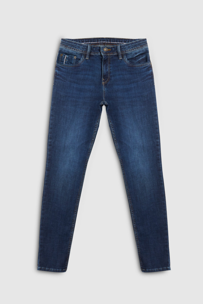 Jean skinny azul con ajuste ceñido, cremallera y tiro bajo