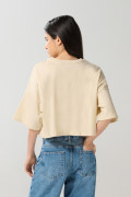 Camiseta oversize kaki crop top con arte de Jurassic Park