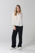 Blusa manga 3/4 unicolor con cuello camisero y prense