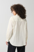Blusa unicolor manga larga en algodón con bolsillo