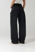 Jean tiro medio baggy gris con bota ancha y bolsillos