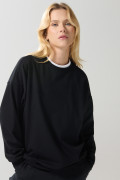 Buzo oversize cuello redondo unicolor con manga larga