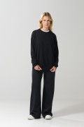 Buzo oversize cuello redondo unicolor con manga larga