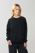 Buzo oversize cuello redondo unicolor con manga larga