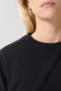 Buzo oversize cuello redondo unicolor con manga larga