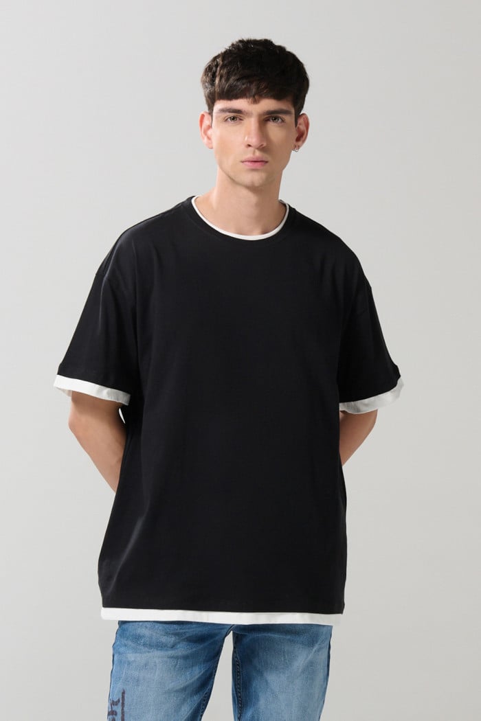Camiseta unicolor manga corta con contrastes oversize