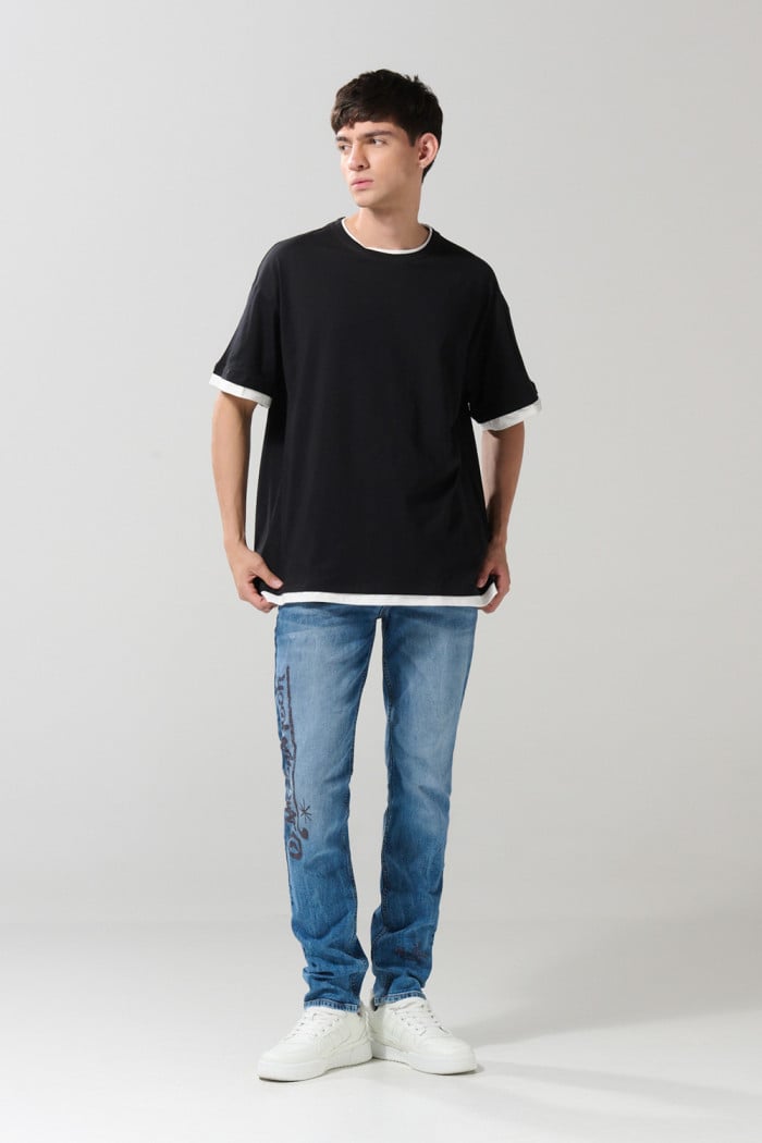 Camiseta unicolor manga corta con contrastes oversize