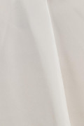 Blusa unicolor con manga 3/4 y prense delantero
