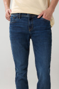 Jean skinny azul con ajuste ceñido, cremallera y tiro bajo
